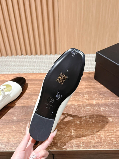 CHANEL 25S BALLET MARY JANES BLACK AND IVORY IN CALFSKIN