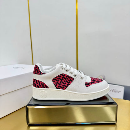 FREE SNEAKER IN WHITE CALFSKIN AND H EN BIAIS RED CANVAS.
