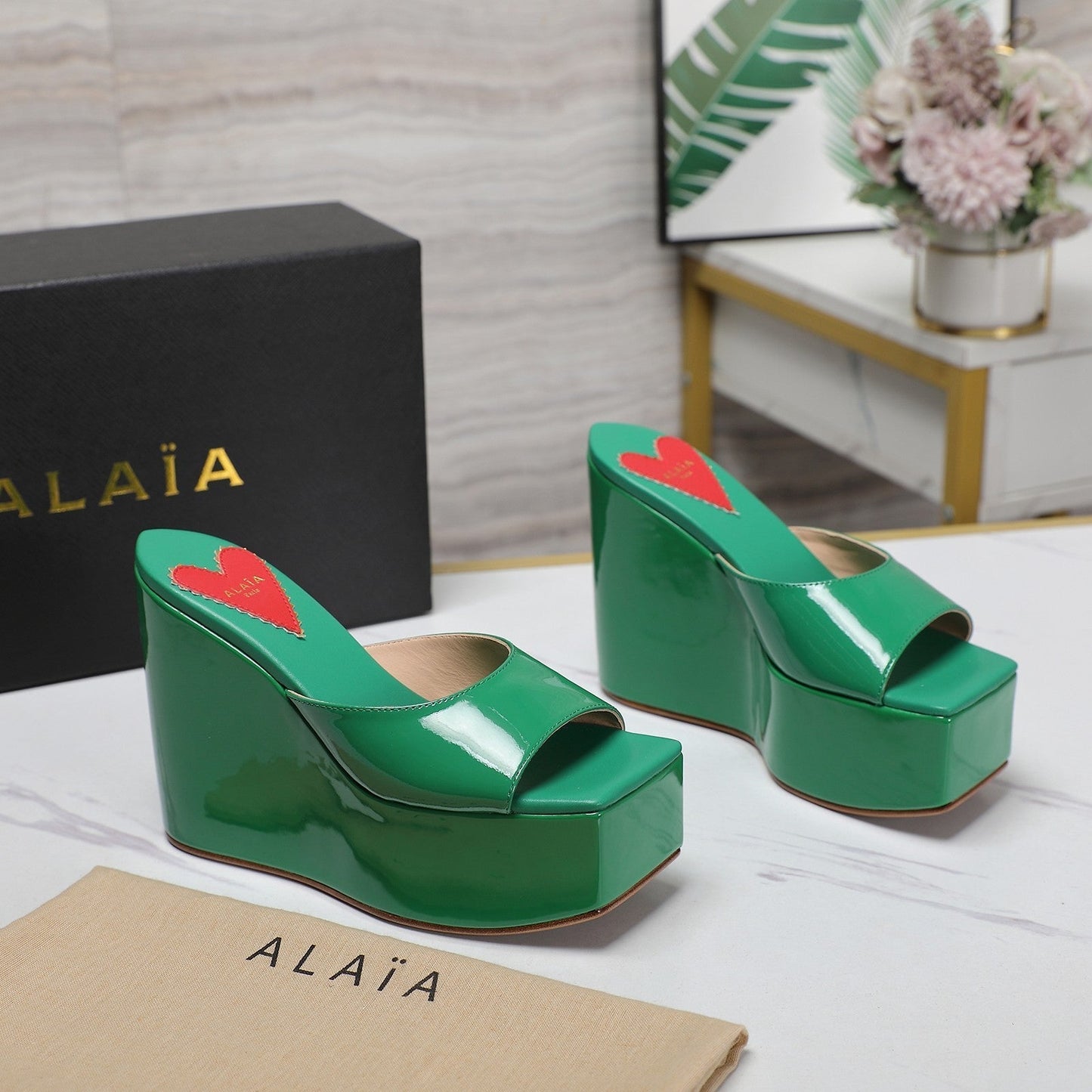 ALAIA PLATFORM WEDGE IN COOL GREEN LAMBSKIN WITH RED HEART