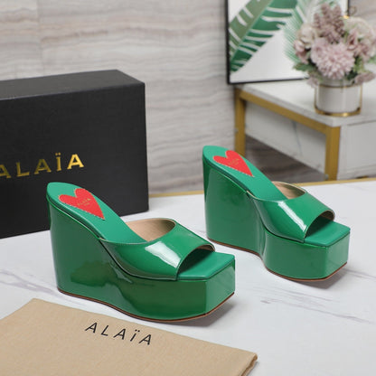 ALAIA PLATFORM WEDGE IN COOL GREEN LAMBSKIN WITH RED HEART
