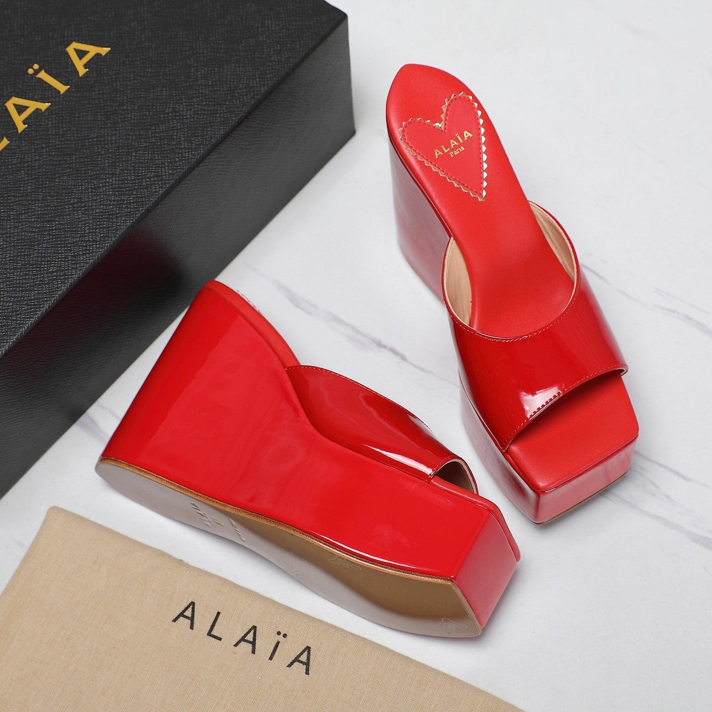 ALAIA PLATFORM WEDGE IN CHERRY RED LAMBSKIN WITH HEART EMBROIDERED