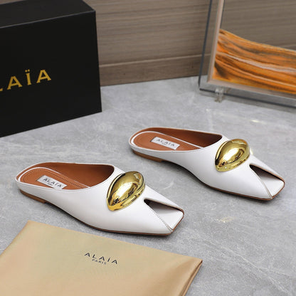ALAIA FLAT MULE IN WHITE LAMBSKIN WITH GOLD HARDWARE