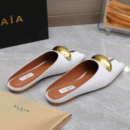 ALAIA FLAT MULE IN WHITE LAMBSKIN WITH GOLD HARDWARE