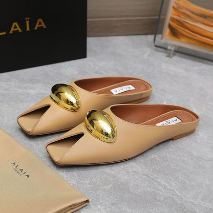 ALAIA FLAT MULE IN SEPIA TAN LAMBSKIN WITH GOLD HARDWARE