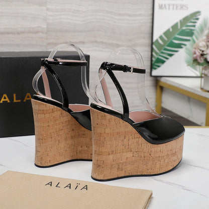 ALAIA WEDGE SANDAL IN BLACK GLOSSY CALFSKIN AND BEIGE RUBBER