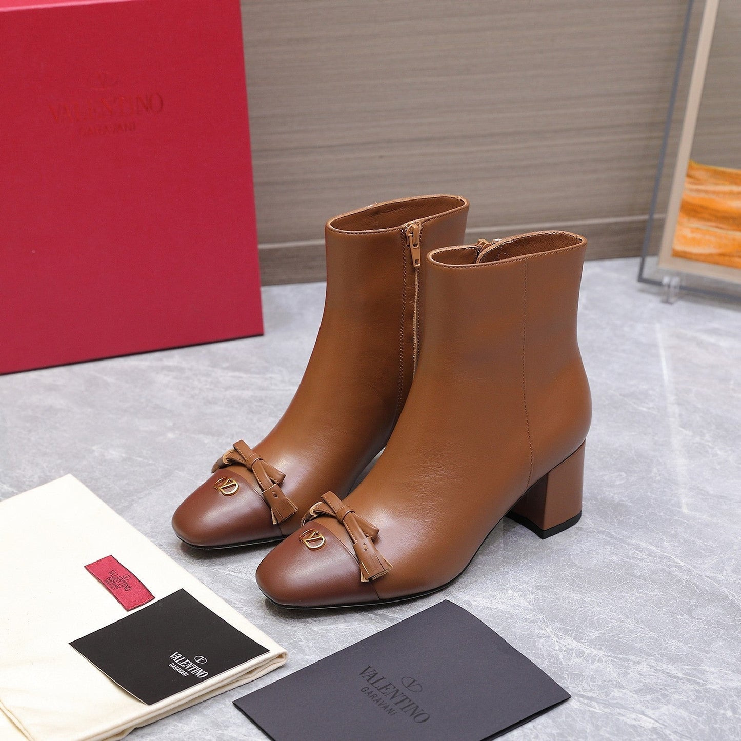 VALENTINO 25S VALET DU ROI ANKLE BOOTS 60 MM IN BROWN CALFSKIN WITH BOW