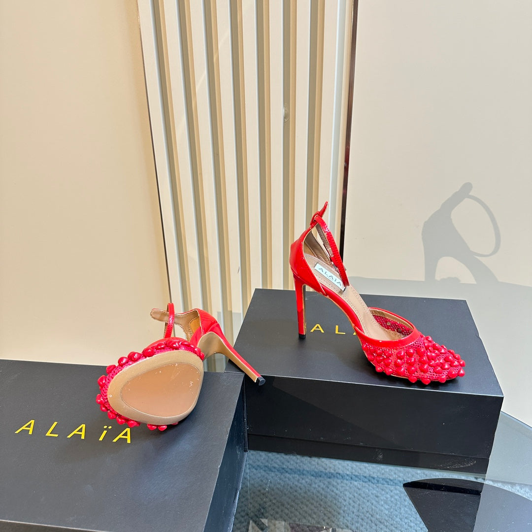 ALAIA HIGH FISHNET PUMPS WITH STUDS IN CHERRY RED LYCRA MESH AND LAMBSKIN