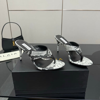 ALAIA HEELED THONG 25S IN WHITE AND BLACK LAMBSKIN SNAKE-EMBOSSED