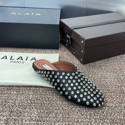 ALAIA FLAT MULES 25S IN BLACK LAMBSKIN EMBELLISHED WITH CRYSTALS