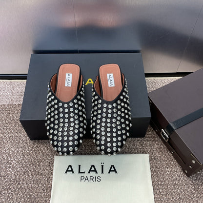 ALAIA FLAT MULES 25S IN BLACK LAMBSKIN EMBELLISHED WITH CRYSTALS