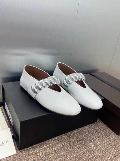 ALAIA MARY JANE FLATS 25S IN WHITE CALFSKIN WITH SILVER HARDWARE
