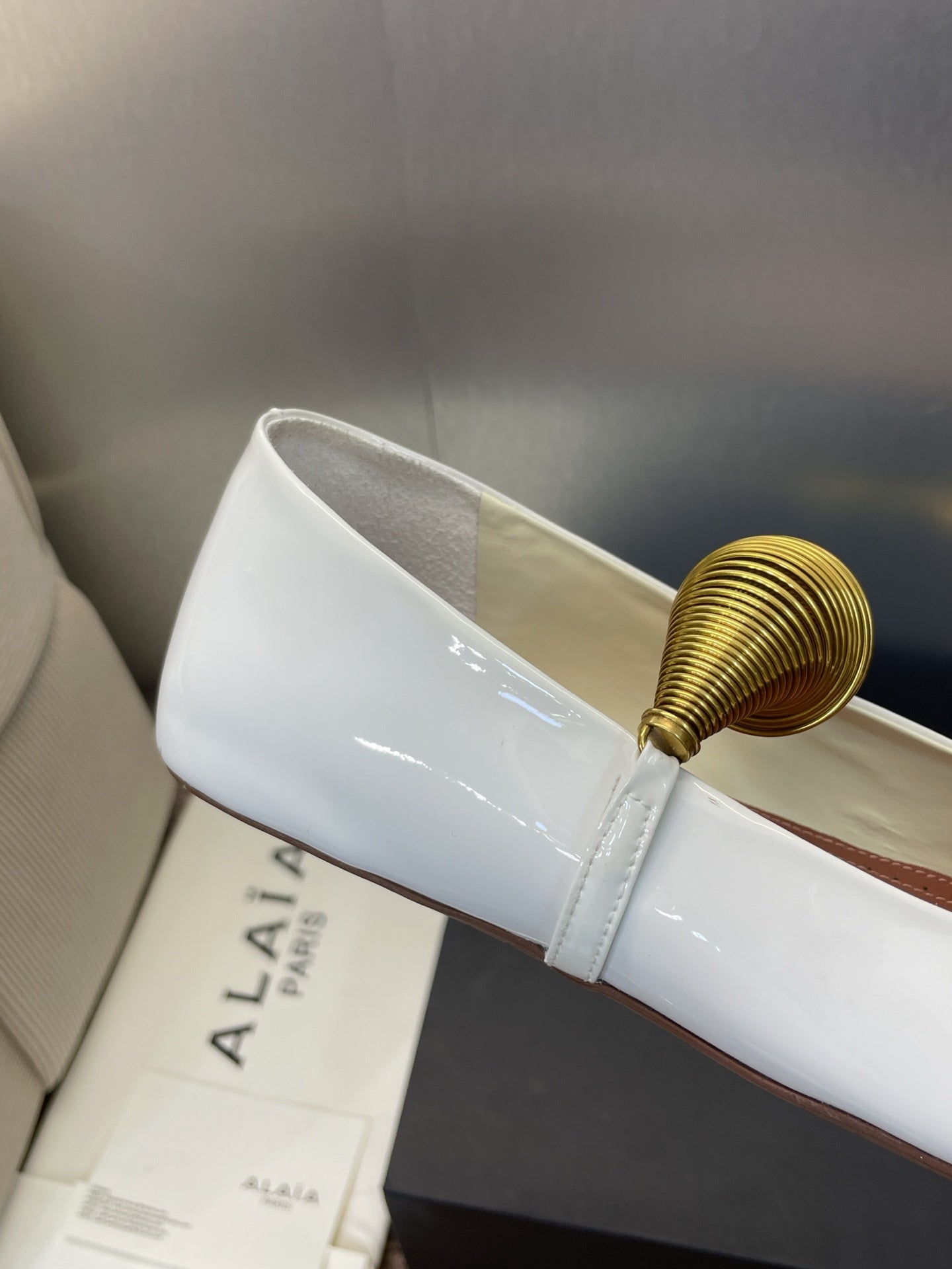 ALAIA BALLET SHOES 25S IN WHITE PATENT LEATHER WITH GOLD HARDWARE