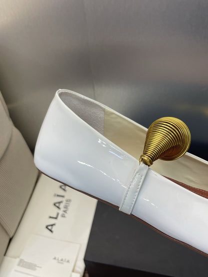 ALAIA BALLET SHOES 25S IN WHITE PATENT LEATHER WITH GOLD HARDWARE