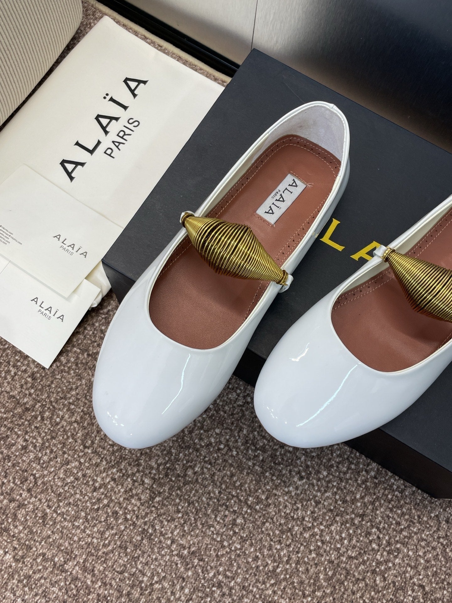 ALAIA BALLET SHOES 25S IN WHITE PATENT LEATHER WITH GOLD HARDWARE