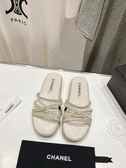 WOVEN STRAP SLIPPERS IN WHITE LAMBSKIN
