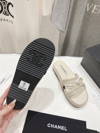 WOVEN STRAP SLIPPERS IN WHITE LAMBSKIN