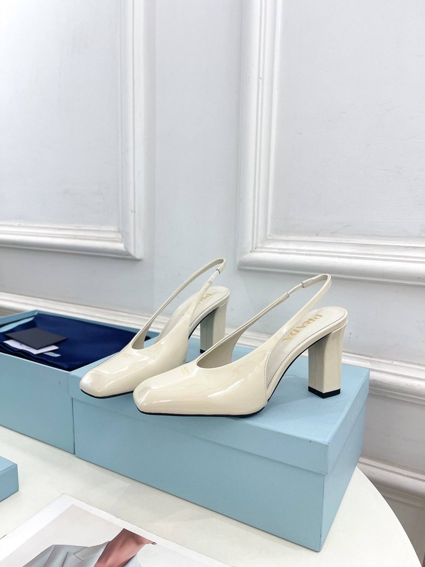 SQUARE TOE SLINGBACK PUMPS IN WHITE GLOSSY CALFSKIN